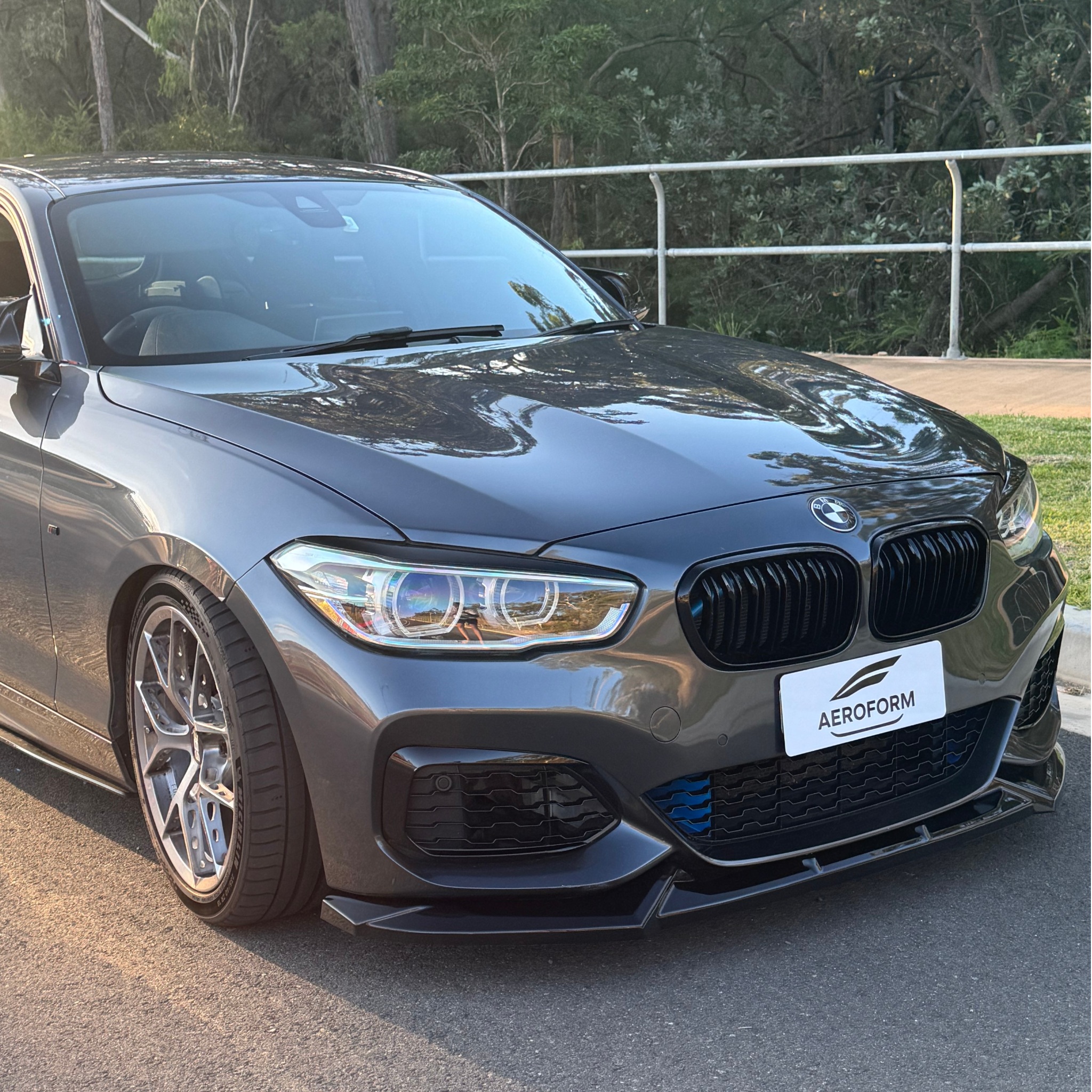 Aero Front Lip (Gloss Black) for 15-19 BMW 1 Series F20 (M-Sport)
